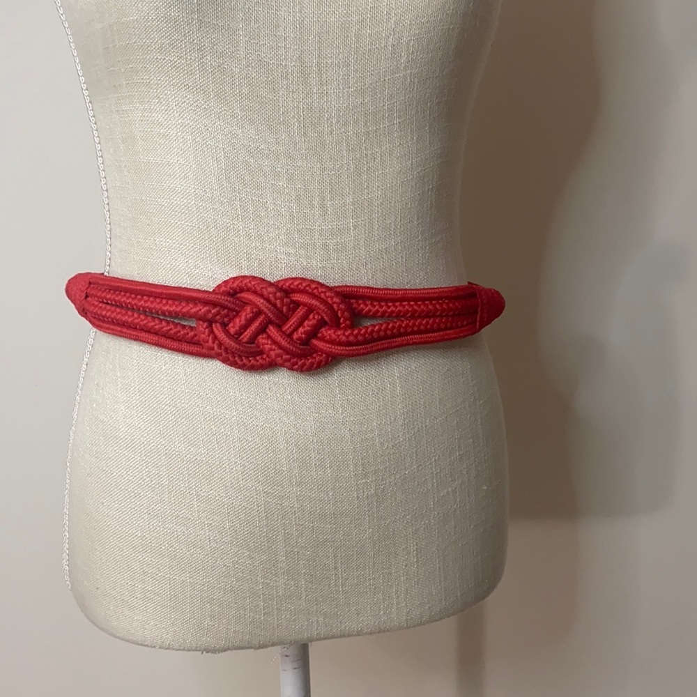 Belt size s/M  orange color waist 28” approximately
